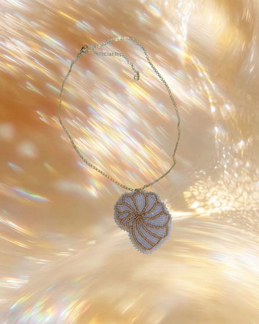 Gold conch necklace
